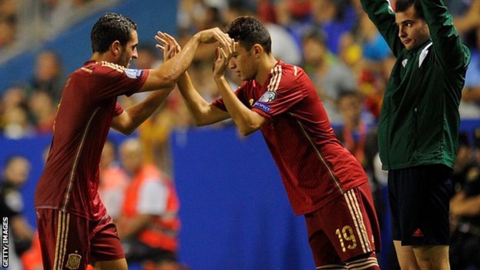 The moment Munir El Haddadi (right) came onto the pitch to replace Koke for Spain against Macedonia in 2014