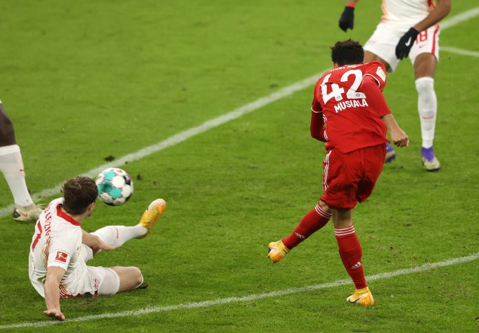 Jamal Musiala scored to help Hansi Flick's side stay top of the Bundesliga