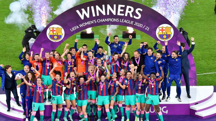Barcelona lift the trophy after winning the UEFA Women's Champions League final against Chelsea