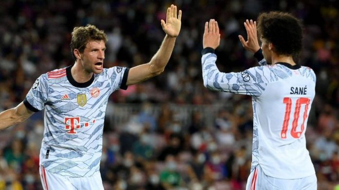 Muller celebrates with Sane