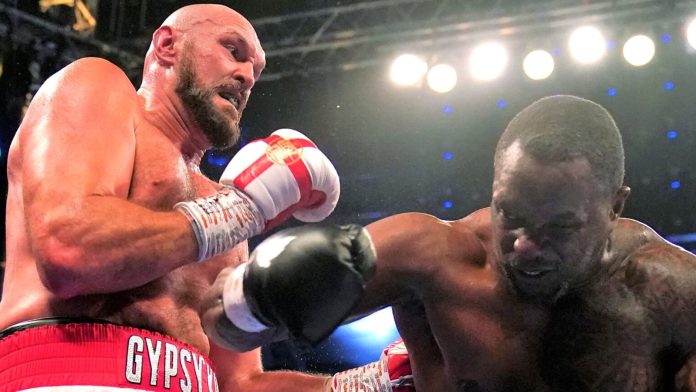 Tyson Fury knocked out Dillian Whyte as he retained his WBC heavyweight title at Wembley