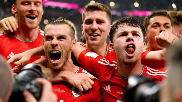 Gareth Bale celebrates with team mates