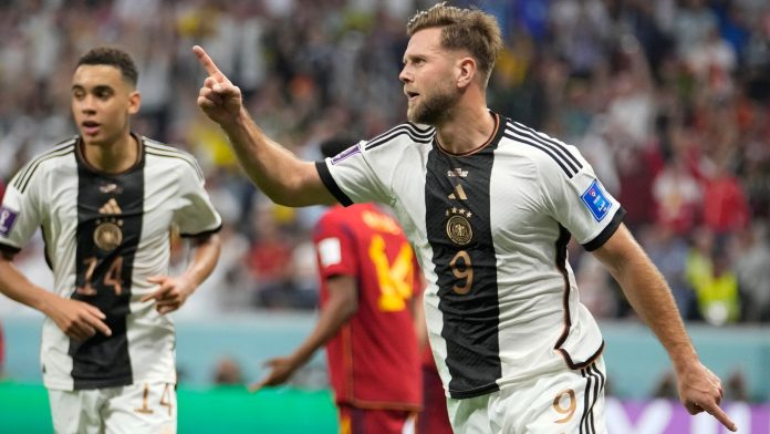 Niclas Fullkrug celebrates after he equalises for Germany against Spain