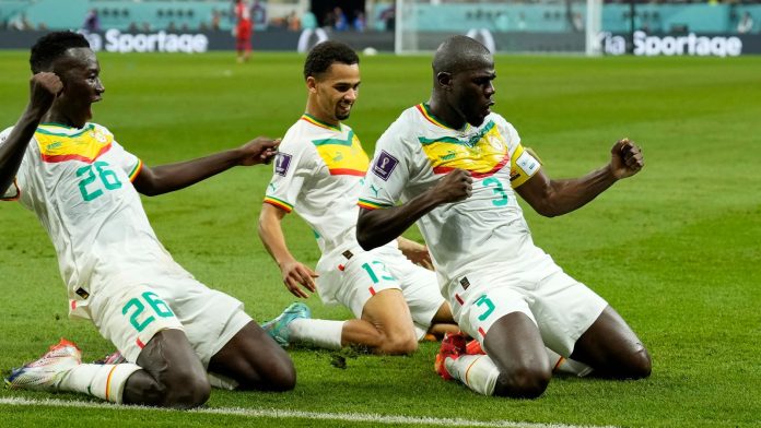 Senegal's Kalidou Koulibaly celebrates with team-mates