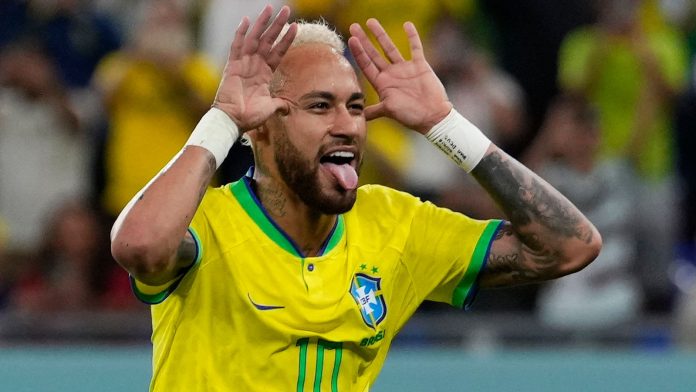 Brazil's Neymar celebrates after scoring his side's second goal