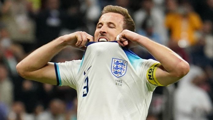 Harry Kane looks on in disbelief after missing England's second penalty