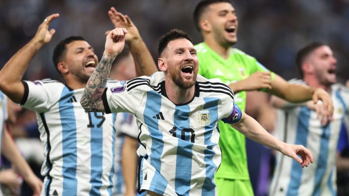 Lionel Messi leads the celebrations after Argentina win the World Cup